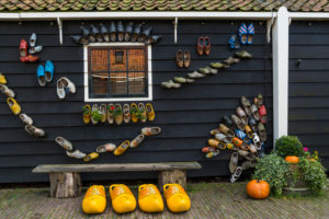 Klompen on a house wall, Zaanse Schans, Zaanstad, Holland, Netherlands Klompen on a house wall, Zaanse Schans, Zaanstad, Holland, Netherlands